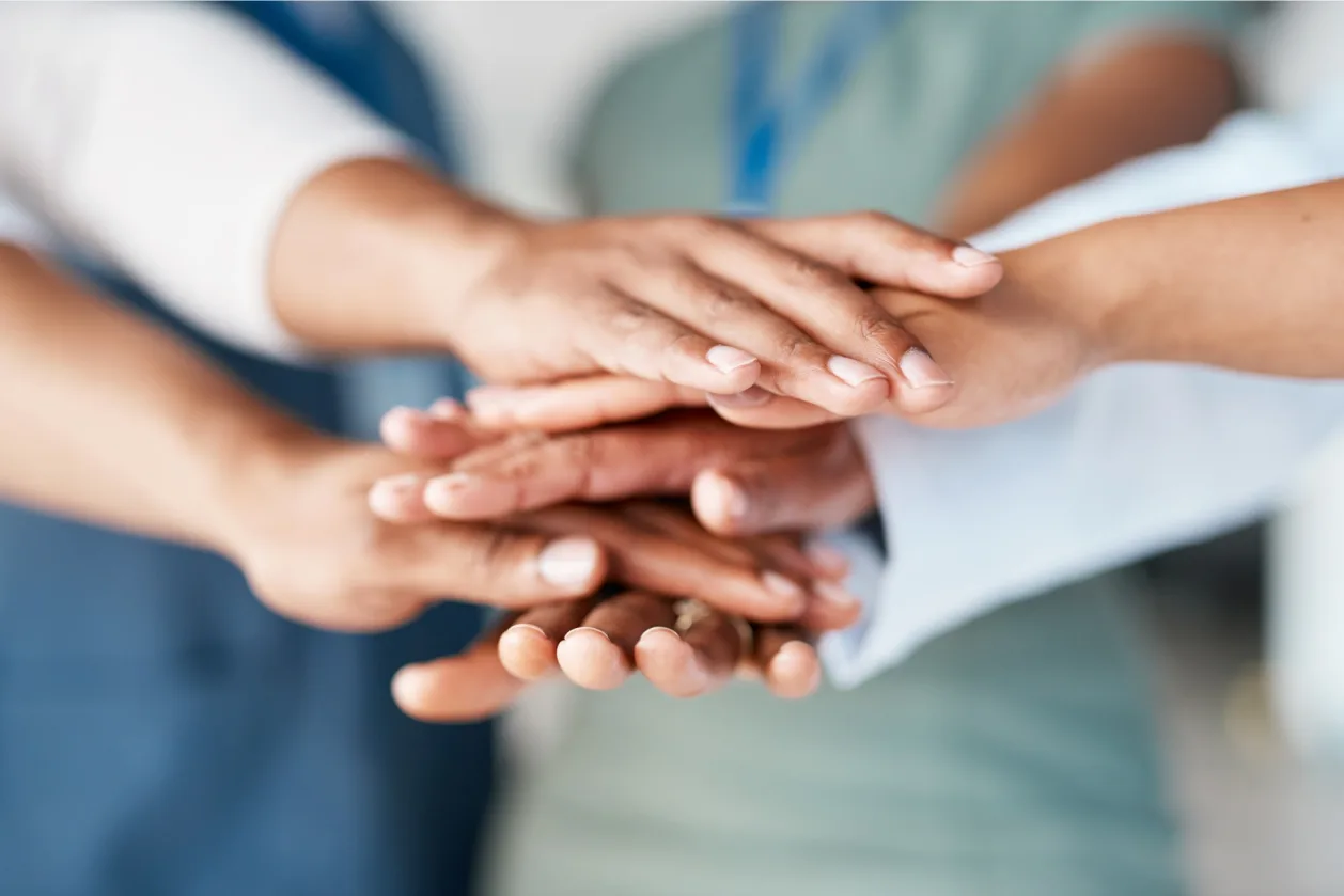 hands together team building concept